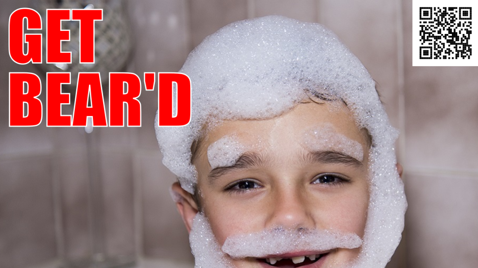 Young boy in a bath with hair and fake beard made of foam - caption: GET BEAR'D